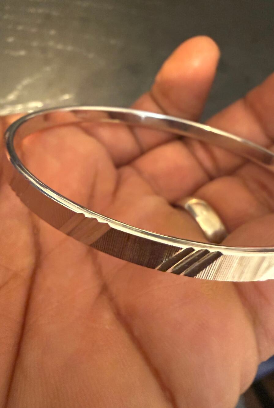 Vintage Signed Monet Silver Tone Etched Bangle Bracelet